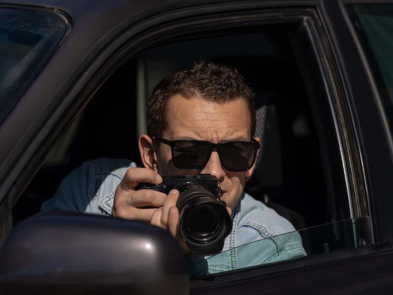 Man In Sunglasses With Camera